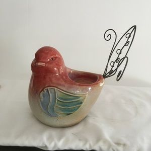 candleholder. 5in.,5 in. Ceramic, wire tail.